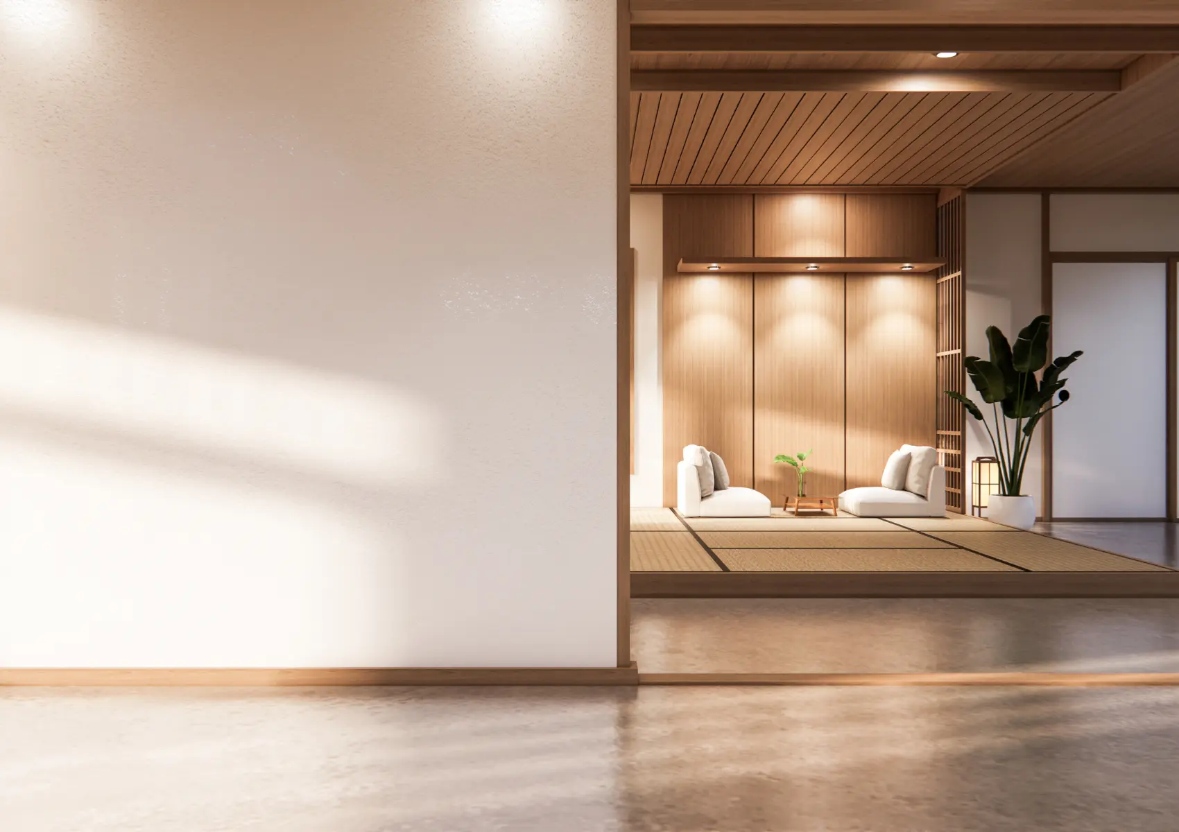 Japanese-style interior with timber ceiling beams and a raised seating area framed by a wide opening