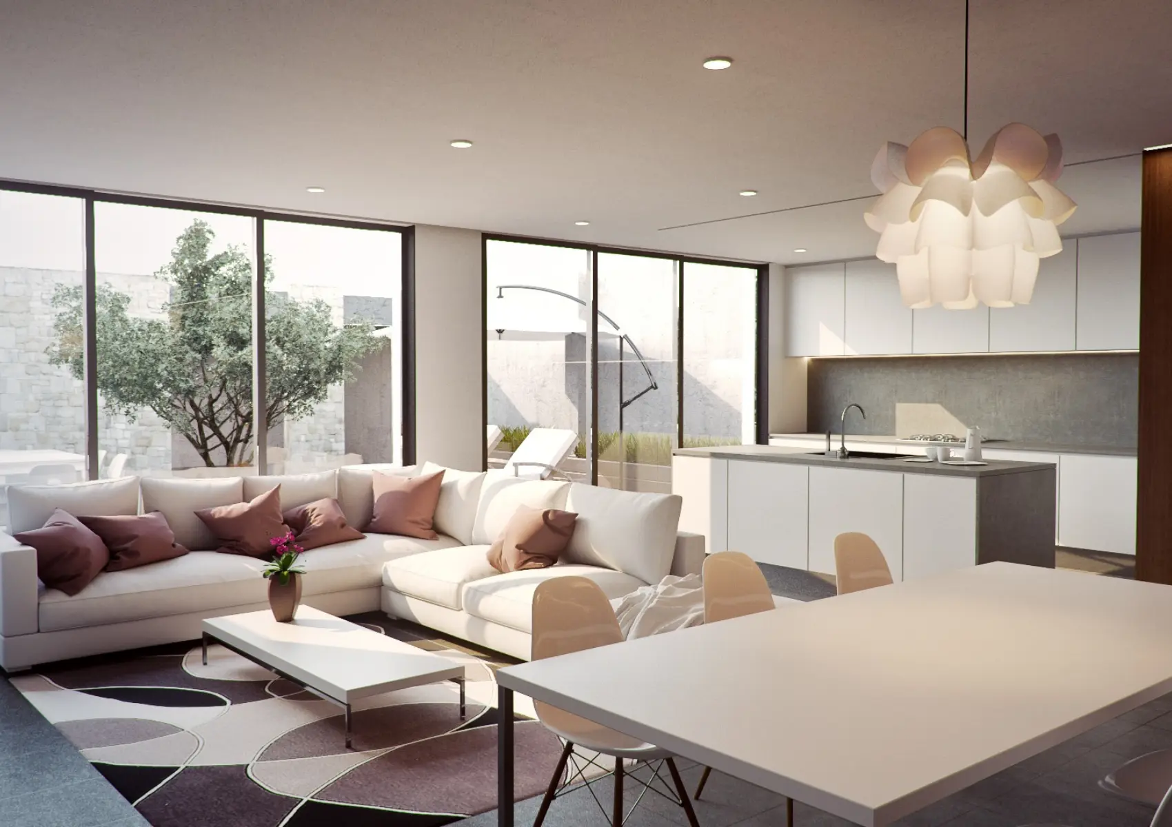 Open-plan living room and kitchen with a corner sofa, island seating and full-height windows